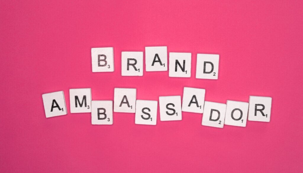 Brand ambassador scrabble letters word on a pink background